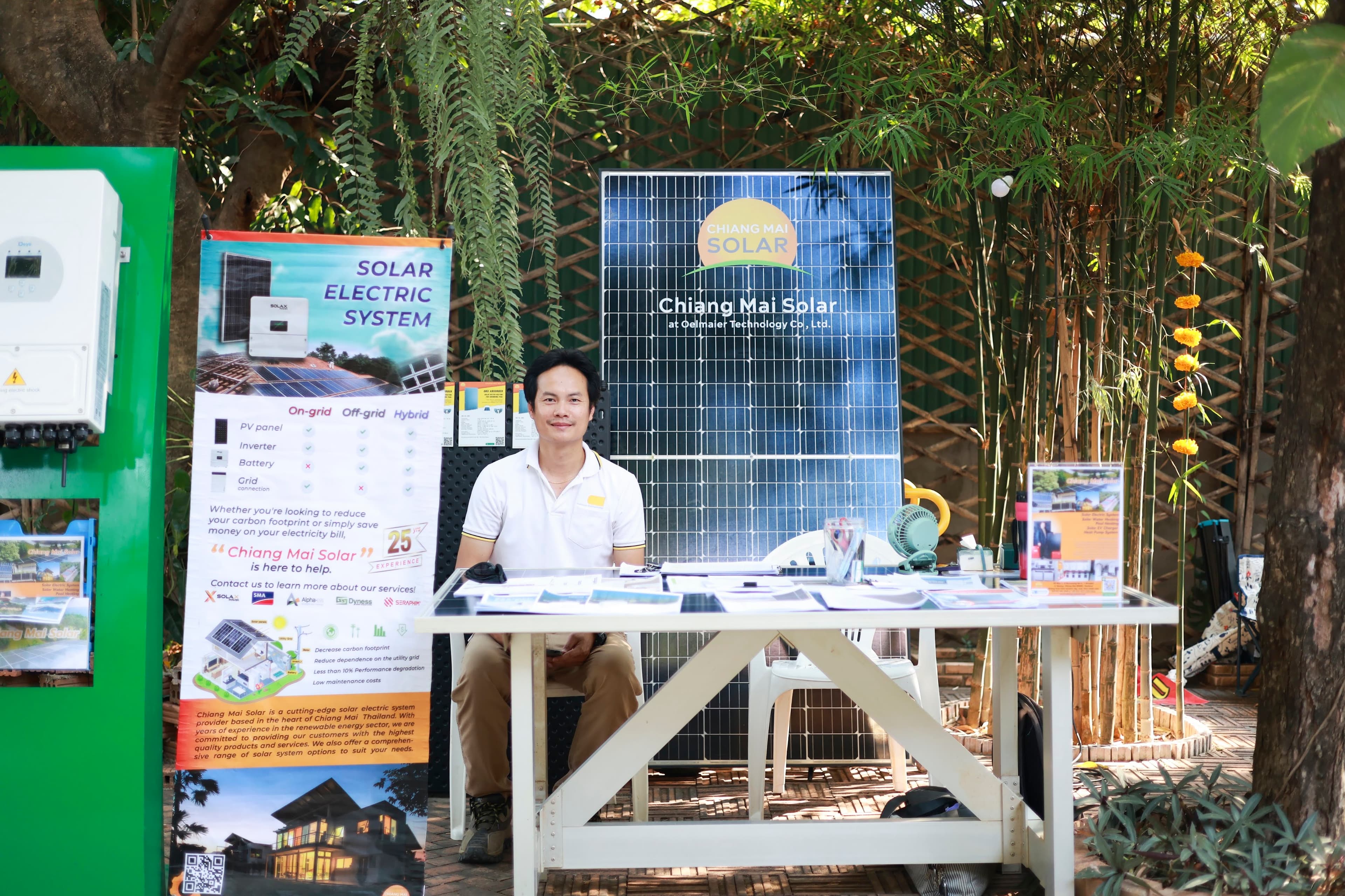 Attendees waving at the camera